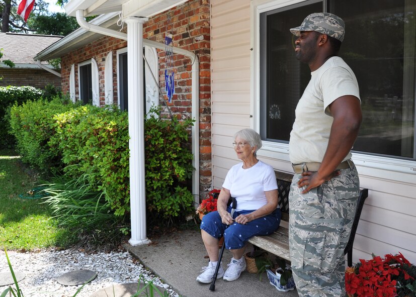 Lucy Harstvedt thanks Staff Sgt. Marcus Capers from Eglin Air Force Base’s 33rd Aircraft Maintenance Squadron as he pauses during a volunteer project April 20 to move her household goods from her longtime home in Shalimar, Fla., to the Bob Hope Village also in Shalimar.  Eight Duke Field and Eglin Airmen answered the call for volunteers to help Harstvedt, widowed since 1964, as she was unable to conduct the move.   Bob Hope Village is a retirement home for surviving spouses of Air Force enlisted members and part of the overall non-profit Air Force Enlisted Village. (U.S. Air Force photo/Dan Neely)