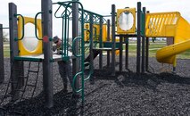 Staff Sgt. Francis Maher, 28th Bomb Wing ground safety technician, reviews playground safety guidelines to verify safety standards during an inspection on Ellsworth Air Force Base, S.D., April 26, 2012. The guidelines outline standards for playgrounds and parks to ensure they are suitable and safe for the children on base. (U.S. Air Force photo by Airman 1st Class Alystria Maurer/Released)