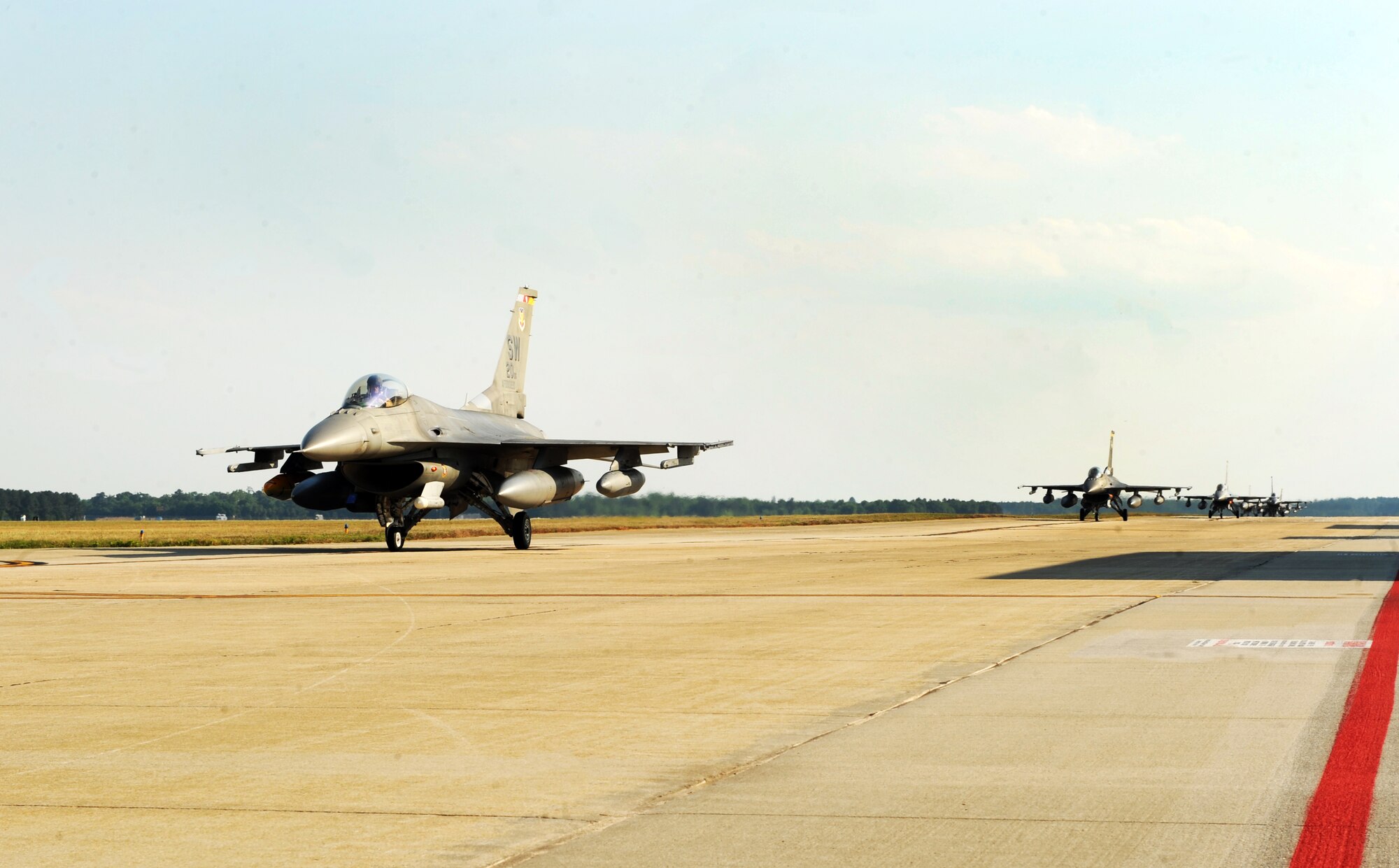 Jets from the 79th Fighter Squadron taxi at Shaw Air Force Base, S.C., April 25, 2012. The 79th FS returned home after a seven-month deployment to Iraq, where they provided top cover for the last convoys to leave Iraq. (U.S. Air Force photo by Senior Airman Tabatha McCarthy/released)
