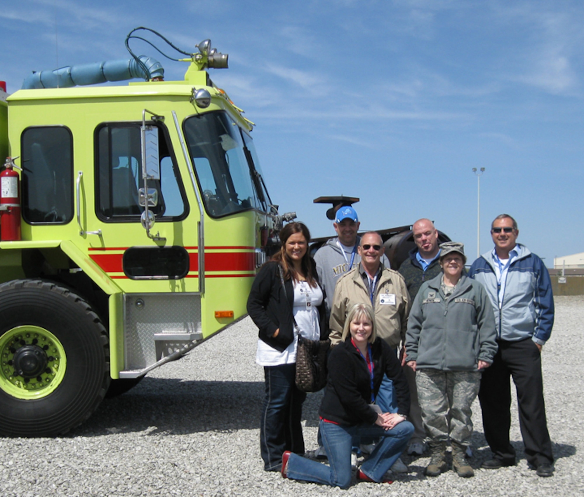 GRISSOM AIR RESERVE BASE, Ind., -- Grissom's honorary commanders, along with Col. Betty Bowen, 434th Mission Support Group commander, pose for a group photo after a visit to the outdoor fire training area.  Colonel Bowen hosted the honorary commanders for a tour of mission support group organizations.  The honorary commanders included (front row) Andrea Zwiebel, mission support group;  (second row) Jessica Green, operations group and Dr. Robert Beckett, Army Reserve; and (back row) Chris Theisen, command chief; Leilan McNally, maintenance group; and Dr. Michael Harris, wing commander.  (U.S. Air Force photo/Lt. Col. Gary Lockard)                             