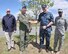 Col. Steven Vautrain, 439th Airlift Wing commander (second from left), and joint-service partners gather around a newly-planted red maple tree April 27 to commemorate Arbor Day at Westover Air Reserve Base. Westover has been named a 