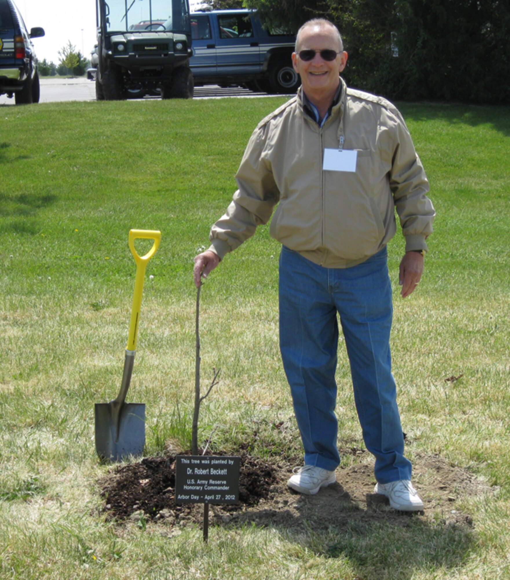 GRISSOM AIR RESERVE BASE, Ind., -- Dr. Robert Beckett, honorary Army reserve commander, was one of six honorary commanders  who participated in a special Arbor Day tree planting ceremony. The event recognized Grissom's commitment to the environment and its designation as a "Tree City USA" by the National Arbor Day Foundation (U.S. Air Force photo/Lt. Col. Gary Lockard)                                                                                                                                                      