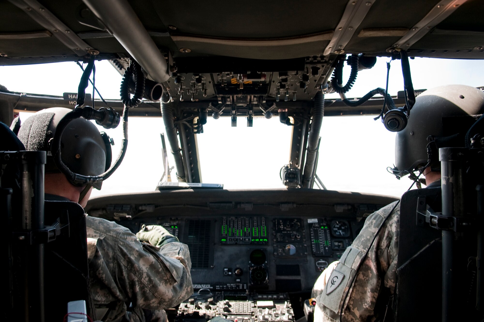 GRISSOM AIR RESERVE BASE, Ind. -- Chief Warrant Officer 3 Ron Walker, left, and Capt. Aaron Fletcher fly their Army National Guard UH-60 Black Hawk over North-Central Indiana during a training exercise April 26. Both pilots are members of the 2-238th General Support Aviation Battalion, Medical Evacuation Unit, which descended upon Grissom April 17 for two weeks of intense pre-deployment training. (U.S. Air Force photo/Tech. Sgt. Mark R. W. Orders-Woempner) 
