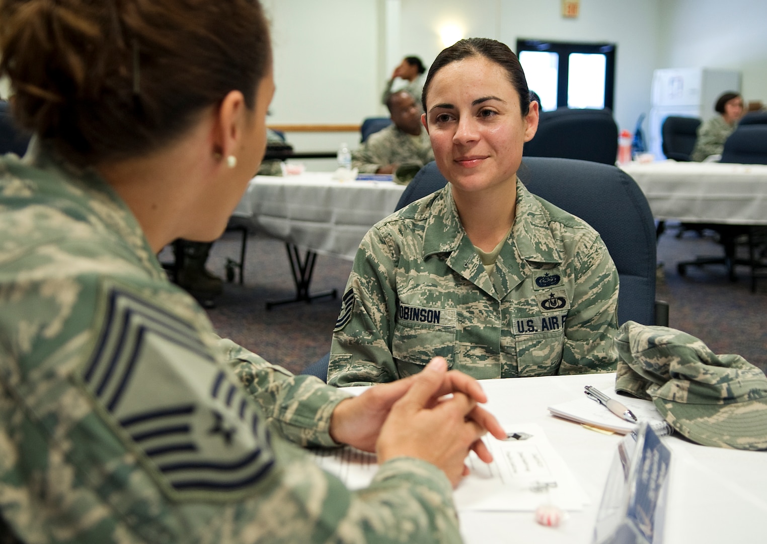 Tech Sgt. Jenny Robinson, Air Force Personnel Center executive services NCO in charge, discusses the future of the Air Force with Chief Master Sgt. Shannon Parker, AFPC Skills Management Branch chief, at the speed mentoring seminar hosted by the Rising 5/6 April 25 at Joint Base San Antonio-Randolph. (U.S. Air Force photo by Benjamin Faske)