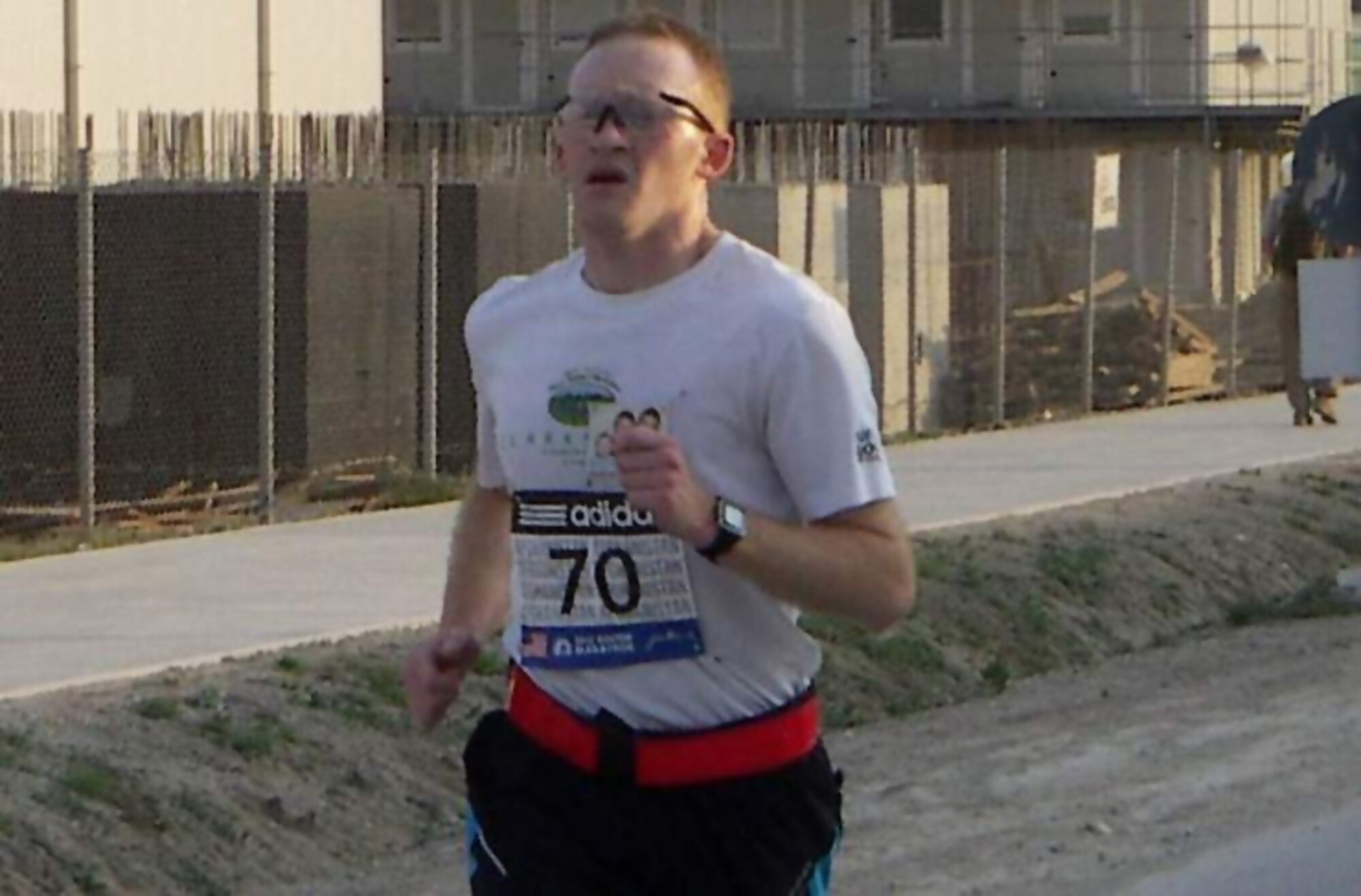 U.S. Air Force Maj. Anthony J. Agbay, deployed from Langley Air Force Base, Va., runs in the Boston Marathon Military Shadow Run in Bagram, Afghanistan, April 16. 2012. He finished sixth out of about 300 starters. (Courtesy Photo)