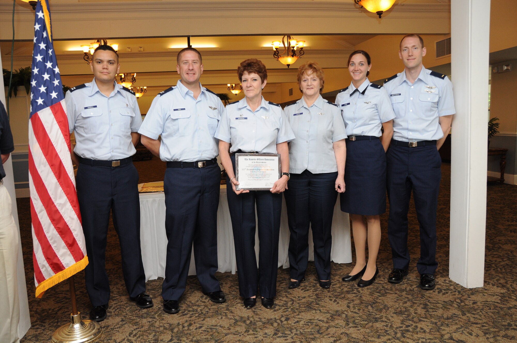 Officers from the 315th Aeromedical Evacuation Squadron at Joint Base Charleston, S.C. represent the 315th Airlift Wing during the Department of South Carolina Reserve Officers Association awards luncheon April 28, 2012 at the Marine Corps Recruit Depot, Paris Island, S.C. The ROA event recognized the accomplishments of various South Carolina reserve organizations and ROA members, and the 315 AES was the recipient of the USAFR Outstanding Unit Award. (U.S. Air Force Photo/Staff Sgt. Shane Ellis)