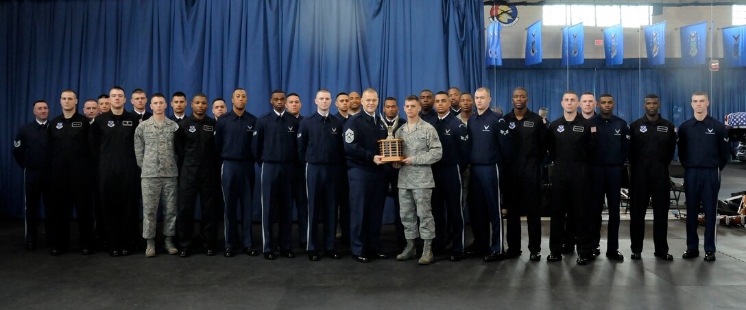 Chief Master Sgt. of the Air Force James A. Roy paid the U.S. Air Force Honor Guard Drill Team a visit April 27 at Joint Base Anacostia-Bolling following their winning performance in the Joint Service Drill Team Competition April 14 at the Thomas Jefferson Memorial in D.C. Chief Roy presented Drill Team members with coins and spent a few minutes on an informal question and answer forum. (U.S. Air Force photo by Senior Airman Susan L. Davis)
