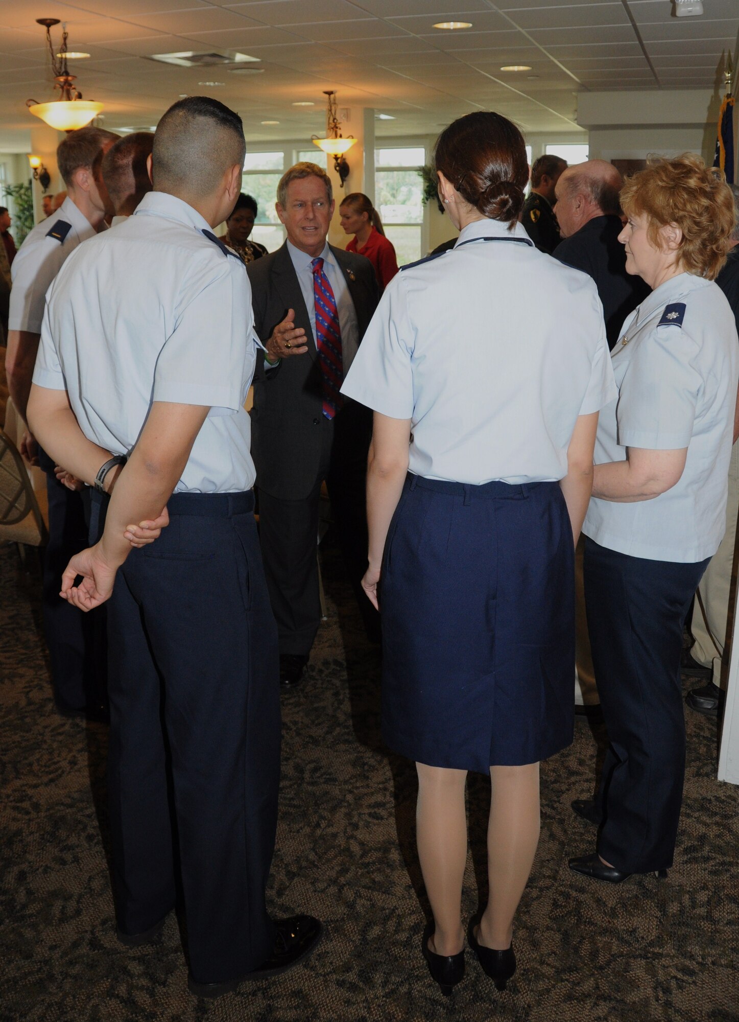 U.S. Congressman Joe Wilson speaks with officers from the 315th Aeromedical Evacuation Squadron April 28, 2012 during the Department of South Carolina Reserve Officers Association awards luncheon at Marine Corps Recruit Depot, Paris Island, S.C. The ROA awards luncheon recognized the accomplishments of various South Carolina reserve organizations and ROA members, and the 315 AES was the recipient of the USAFR Outstanding Unit Award. (U.S. Air Force Photo/Staff Sgt. Shane Ellis)