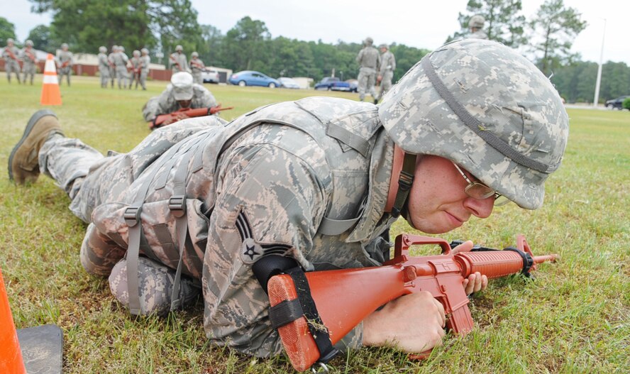 U.S. Air Force Senior Airman Michael Worley high-crawls while practicing combat maneuvers in preparation for an operational readiness exercise on Seymour Johnson Air Force Base, N.C., April 27, 2012. High crawling is used when cover and concealment are available and when speed is necessary. Worley, 4th Civil Engineer Squadron water and fuels systems maintenance journeyman, hails from North Carolina. (U.S. Air Force photo/Airman 1st Class Aubrey Robinson/Released)