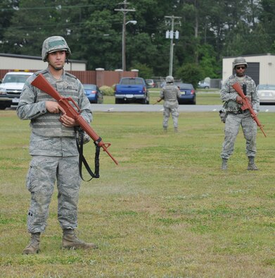 4th Civil Engineer Squadron Airmen practice setting a perimeter on Seymour Johnson Air Force Base, N.C., April 26, 2012. With an operational readiness exercise steadily approaching, 4th CES Airmen took advantage of an opportunity to complete refresher training on proper combat defense maneuvers. (U.S. Air Force photo/Airman 1st Class Aubrey Robinson/Released)