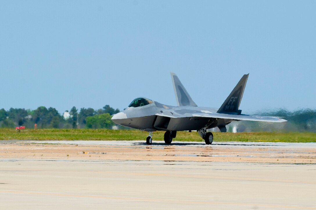 U.S. Air Force Lt. Col. Jason Hinds, 94th Fighter Squadron commander, lands the final F-22 Raptor to arrive at Langley Air Force Base, Va., April 27, 2012.  The F-22 Raptor’s combination of stealth, super cruise, maneuverability and integrated avionics, coupled with improved supportability, represents an exponential leap in war fighting capabilities. (U.S. Air Force photo by Airman 1st Class Kayla Newman/Released)