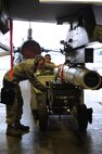 U.S. Air Force Staff Sgt. Derek Pascoe, 35th Aircraft Maintenance Squadron load crew team chief, unloads an AGM-88 high-speed anti-radiation missile from an F-16 Fighting Falcon Aircraft in preparation for phase 2 of an operational readiness exercise at Misawa Air Base, Japan, April 28, 2012. OREs test the combat readiness of the wing and its ability to execute assigned missions and tasks. (U.S. Air Force photo by Airman 1st Class Kia Atkins/Released)