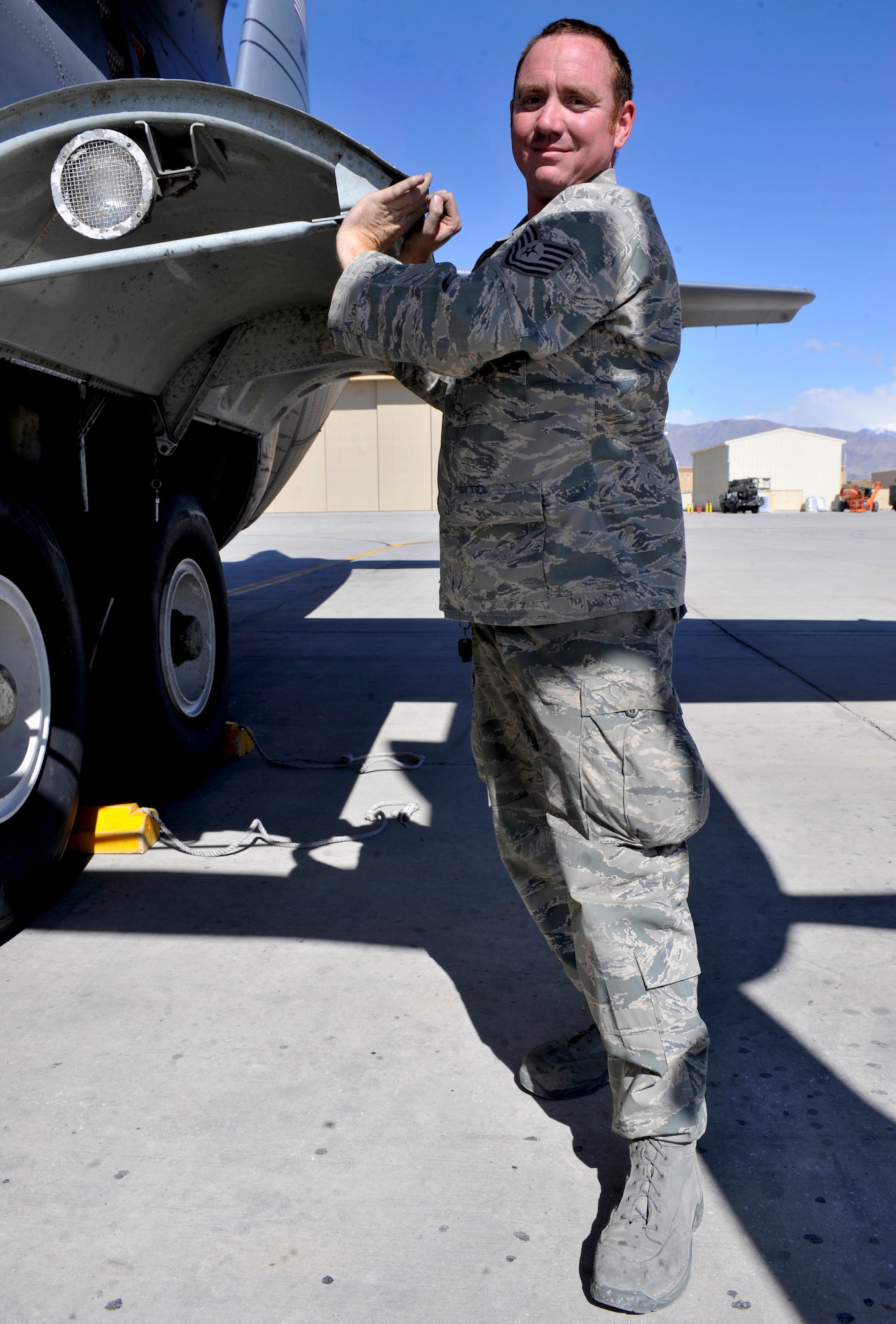 Tech. Sgt. Joshua Price performs wheel maintenance on a C-130 at Bagram Airfield, Afghanistan, April 30, 2012. Price is a crew chief with the 455th Expeditionary Aircraft Maintenance Squadron and is deployed from the 130th Airlift Wing, Yeager Airport. Charleston, W. Va. (U.S. Air Force photo/Airman 1st Class Ericka Engblom)
