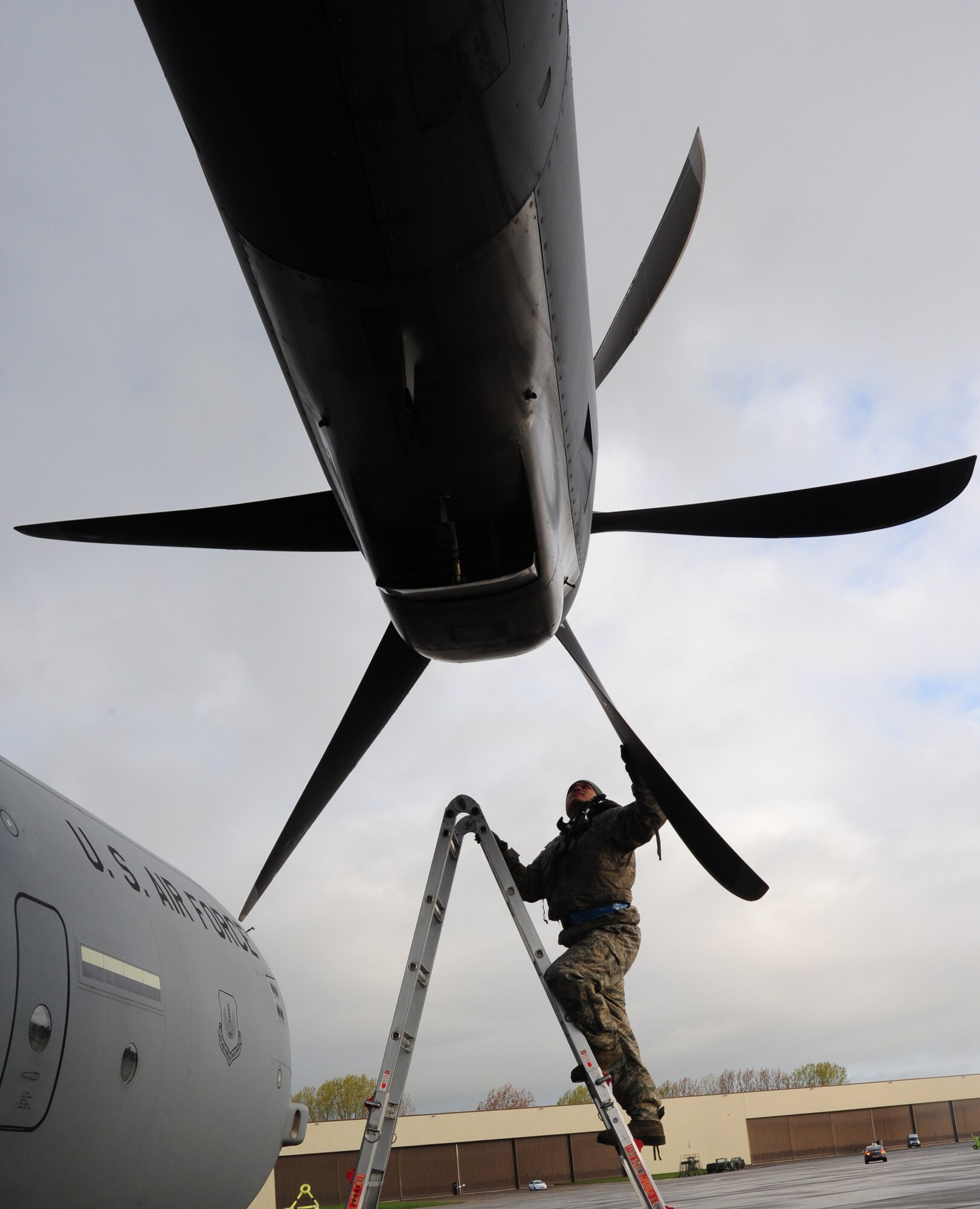 Tech. Sgt. Bryan Campbell 86th Aircraft Maintenance Squadron flying crew chief, inspects the propellers of a C-130J Super Hercules prior to take-off at RAF Fairford, England, April 25. Engine checks are performed routinely before every flight to ensure the engines are in proper repair and ready for the aircrafts next mission. (U.S. Air Force photo/Airman 1st Class Trevor Rhynes)
