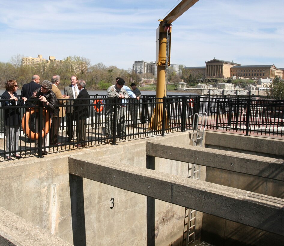 PHILADELPHIA, Pa. — Terry Fowler, Project Manager with the U.S. Army Corps of Engineers Philadelphia District, discusses the Fairmount Dam Fish Ladder project with Assistant Secretary of Army for Civil Works Jo-Ellen Darcy. The project included rebuilding the fish passage to improve its functionality.