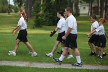Young Marines from the Young Marine program aboard Marine Corps Air Station New River march en route to their physical fitness training, July 25. The Young Marines are participating in a weeklong encampment in Florida beginning Aug. 4. During their trip, the Young Marines will participate in various activities such as swim qualification, small-arms fire and outdoors survival.
