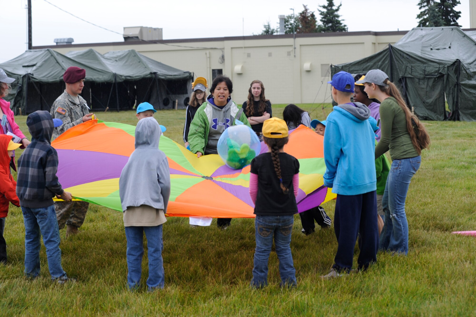 Children and staff play outdoor games during Vacation Bible School at Chapel One on Joint Base Elmendorf-Richardson, Alaska July 30. The VBS was conducted by the base Chapel Center and was supported by members of the Army and Air Force as well as more than 70 volunteers.  The event was held from July 30 to Aug. 3rd.(U.S. Air Force photo/Staff Sgt. Robert Barnett)