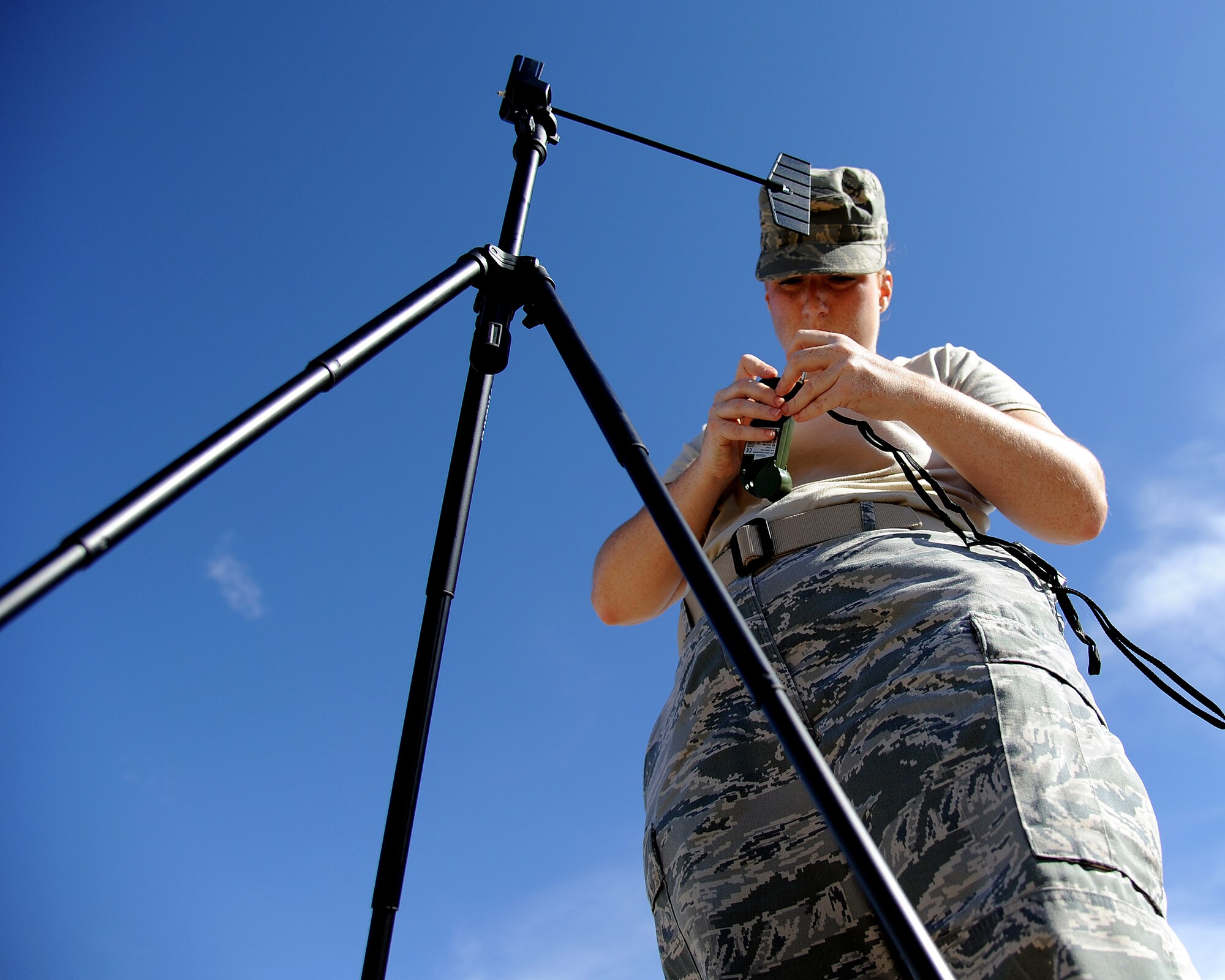 Staff Sgt. Kimberly Cribbs, 817th CRG weather NCOICC, does her regular check on the wind speed, cross wind and head wind during Exercise Mile High Response July 23-26, at Camp Guernsey Joint Training Center, in Guernsey, Wyo. (U.S. Air Force Photo/Tech. Sgt. Lesley Waters)