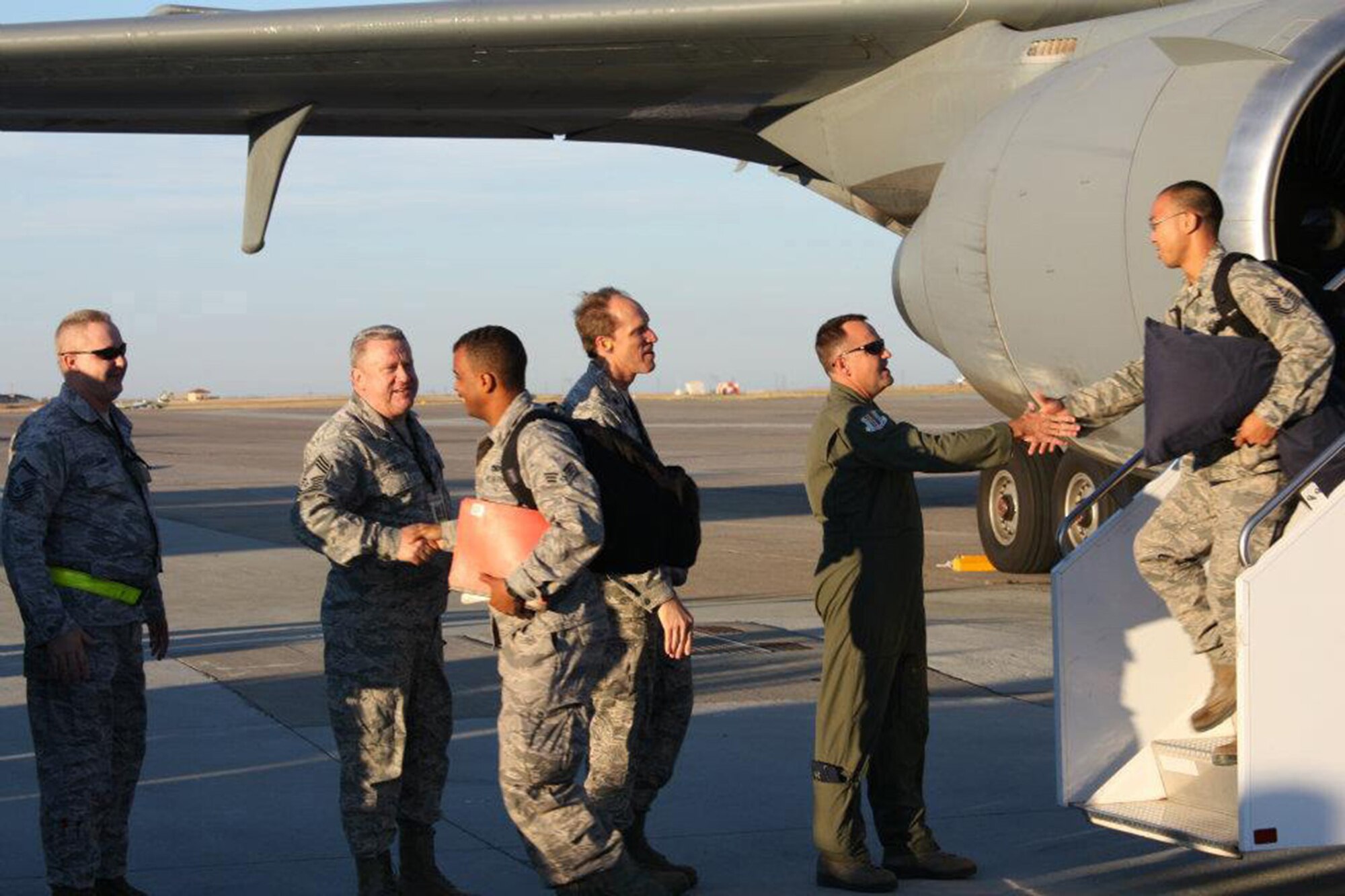 TRAVIS AIR FORCE BASE, Calif. -- Member of the Travis Team, along with base leadership welcomed home more than forty Airmen from Travis Air Force Base and Beale AFB, Calif., from a six-month deployment to Southwest Asia, July 26.  Most of the Airmen were Traditional Reservists from the 749th Aircraft Maintenance Squadron. While deployed, these Airmen provided aircraft maintenance support for the KC-10 Extender. (U.S. Air Force photo/Major Torri Crosby). 