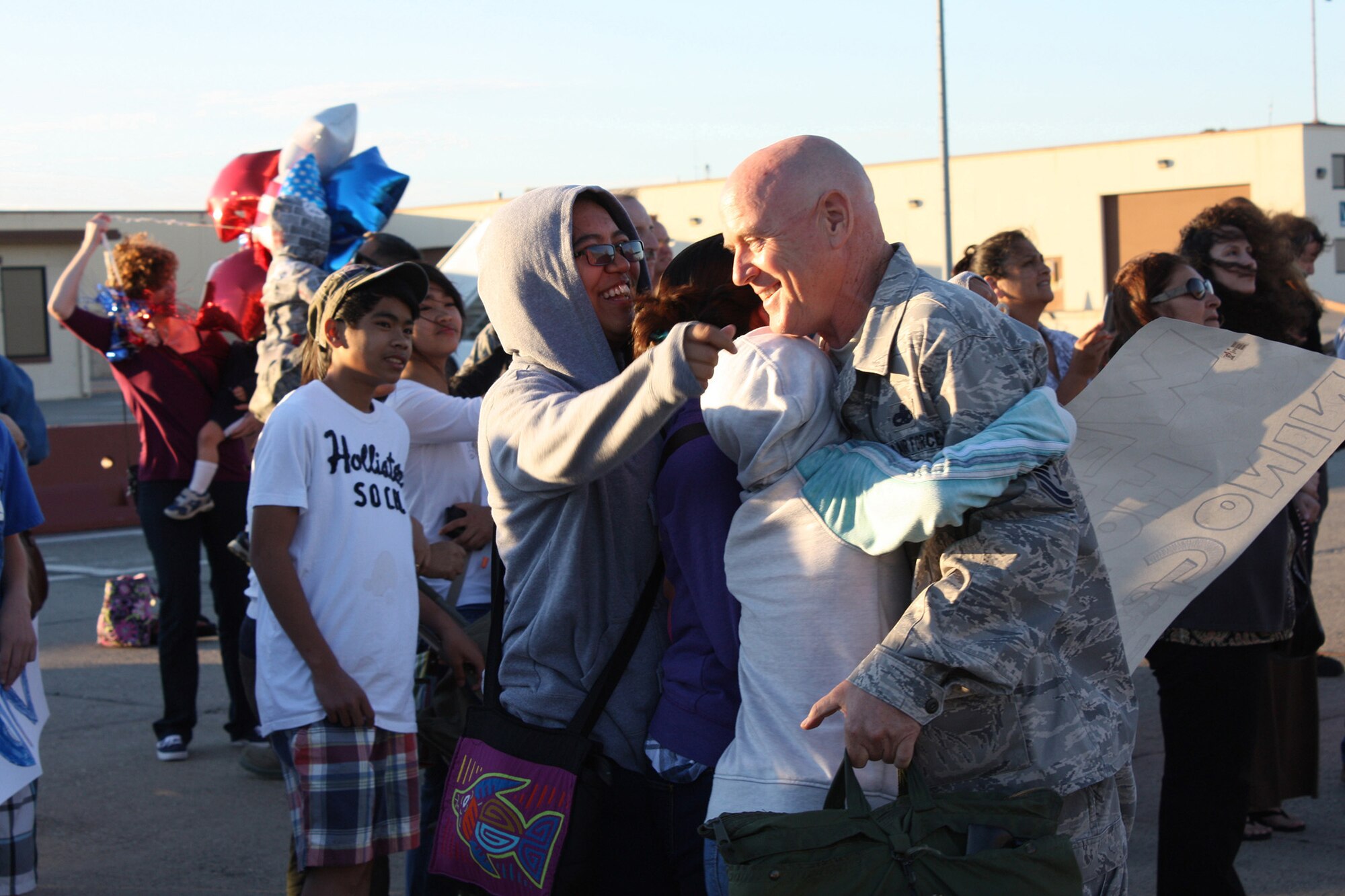 TRAVIS AIR FORCE BASE, Calif. -- Senior Master Sgt. George LeBlanc is welcomed home by his family after his 6-month deployment to Southwest Asia. Senior Master Sgt. LeBlanc is a Traditional Reservist from the 749th Aircraft Maintenance Squadron and works as a civilian for a commercial airline. While deployed, he provided aircraft maintenance support for the KC-10 Extender. More than forty Airmen from Travis Air Force Base and Beale AFB, Calif. returned home, July 26, from Southwest Asia. (U.S. Air Force photo/Major Torri Crosby)