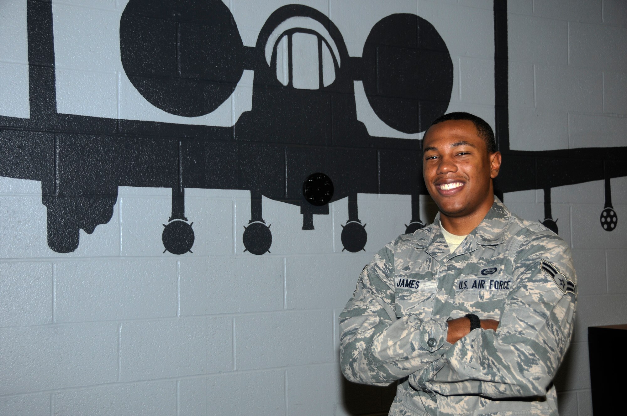Airman 1st Class Jeremy James, an intelligence analyst with the 188th Operations Group, was selected as the 188th Fighter Wing’s Flying Razorback spotlight for August 2012. (National Guard photo by Airman 1st Class Hannah Landeros/188th Fighter Wing Public Affairs)