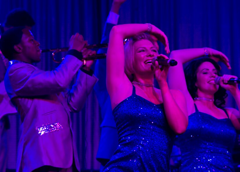 Airmen from Tops in Blue perform for members of Dyess Air Force Base and the surrounding Abilene community July 31, 2012, at the Civic Center in Abilene, Texas. Tops in Blue, composed of 35-40 musicians, singers, dancers and technicians, travels around the world performing for military personnel and their families. The amateur performers made their first stop at Dyess after returning from Southwest Asia. (U.S. Air Force photo by Airman 1st Class Peter Thompson/ Released)