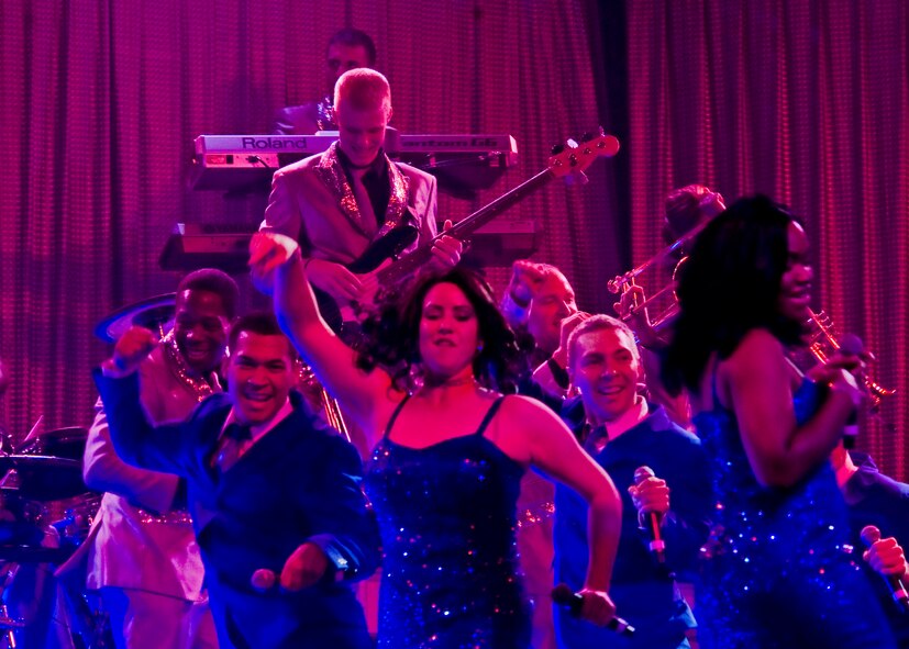 Airmen from Tops in Blue perform for members of Dyess Air Force Base and the surrounding Abilene community July 31, 2012, at the Civic Center in Abilene, Texas. Tops in Blue, composed of 35-40 musicians, singers, dancers and technicians, travels around the world performing for military personnel and their families. The amateur performers made their first stop at Dyess after returning from Southwest Asia. (U.S. Air Force photo by Airman 1st Class Peter Thompson/ Released)