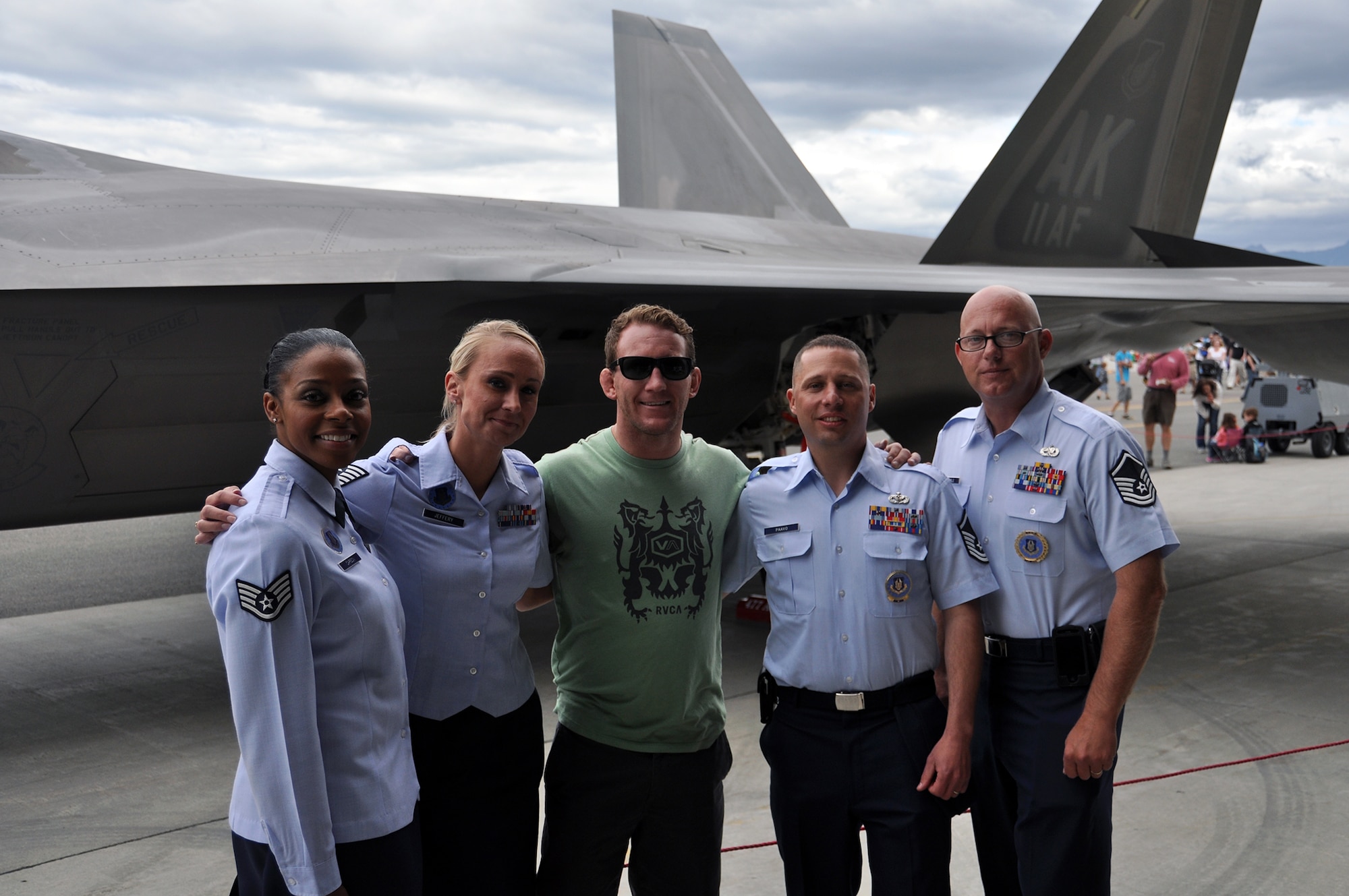 JOINT BASE ELMENDORF-RICHARDSON, Alaska. Members if the Air Force Reserve recruiting team hanging out with UFC fighter Gray Maynard at the 2012 Arctic Thunder Open House. The Open House gave the recruiters an opportunity to share the Air Force Reserve story with thousands of members of the Anchorage community. (U.S. Air Force Photo/Tech. Sgt Dana Rosso)      