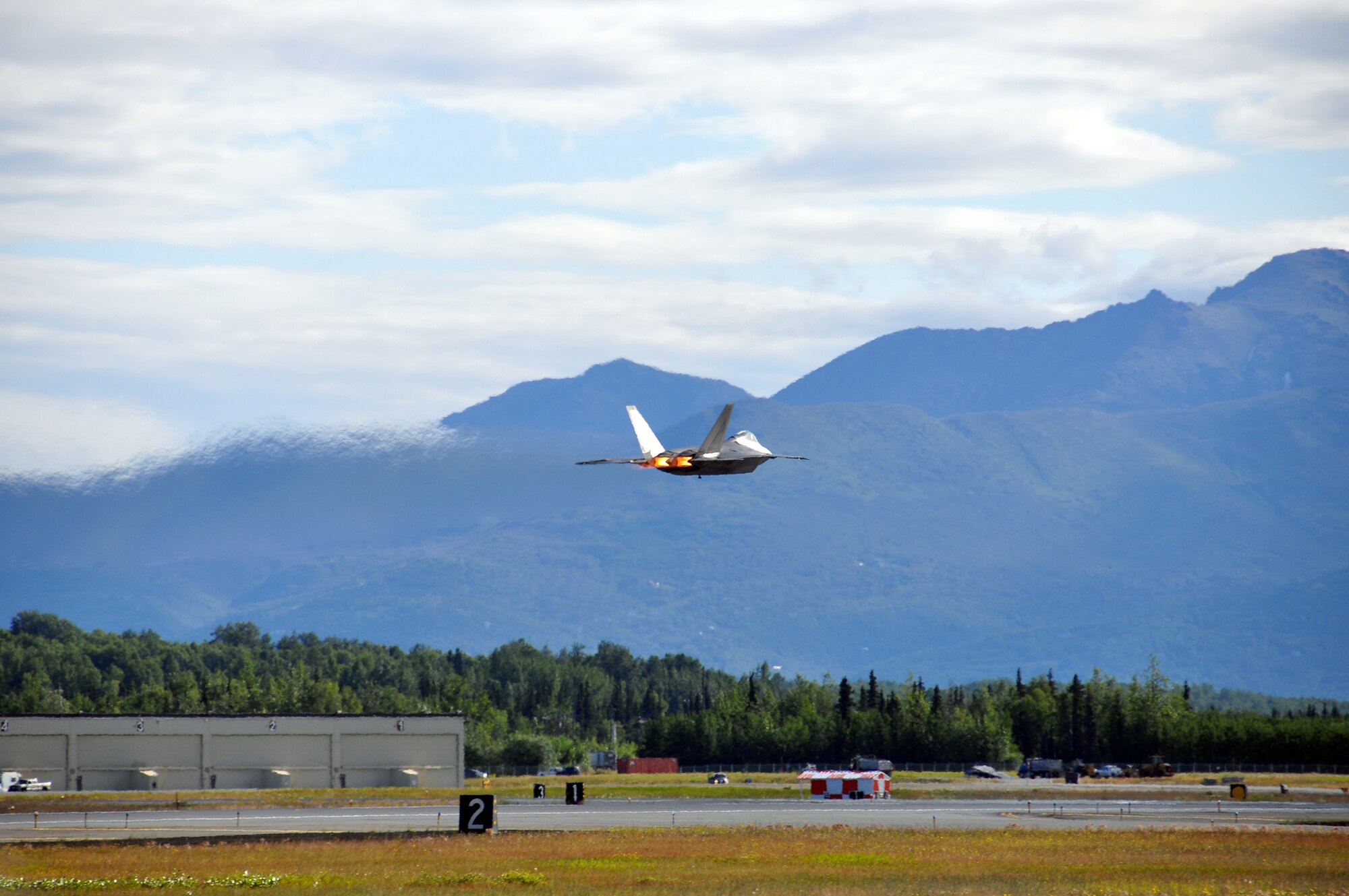 JOINT BASE ELMENDORF-RICHARDSON, Alaska. During Arctic Thunder Open House 2012, an F-22 from the 3rd Wing demonstrates its power and maneuverability. (U.S. Air Force Photo/Tech. Sgt Dana Rosso) 