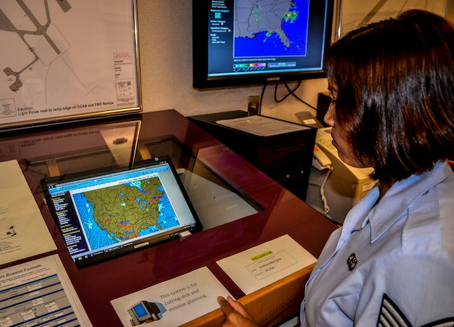 Staff Sgt. Marlyn Daust, 437th Operations Support Squadron Weather Flight weather forecaster, observes wind shearing in the clouds July 31, 2012 at Joint Base Charleston – Air Base, S.C. Each day, a weather forecaster walks to the flight line to observe the weather to see conditions are safe for aircraft to take off and land here. (U.S. Air Force photo by Senior Airman Anthony Hyatt