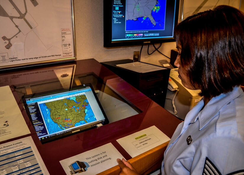 Staff Sgt. Marlyn Daust, 437th Operations Support Squadron Weather Flight weather forecaster, observes wind shearing in the clouds July 31, 2012 at Joint Base Charleston – Air Base, S.C. Each day, a weather forecaster walks to the flight line to observe the weather to see conditions are safe for aircraft to take off and land here. (U.S. Air Force photo by Senior Airman Anthony Hyatt