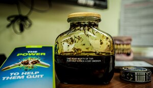 The Joint Base Charleston’s Health and Wellness Center displays a jar of tar and pamphlets near their front desk to show HAWC patrons the dangers of smoking. The HAWC’s mission is to cultivate a fit and healthy force. They achieve this through classes and services such as nutritional, exercise, tobacco cessation as well as wellness and relaxation. (U.S. Air Force photo by Senior Airman Dennis Sloan/Released)