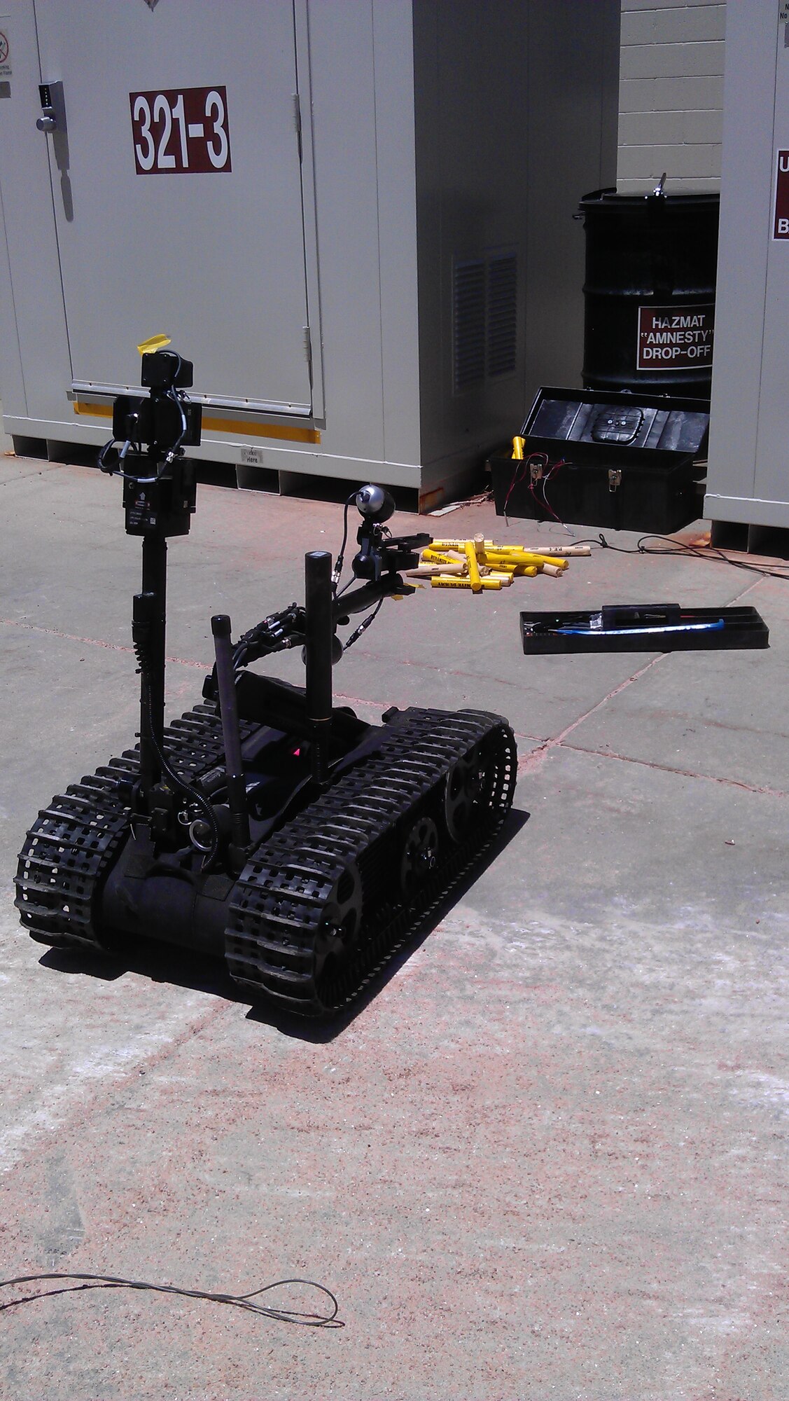CHEYENNE MOUNTAIN AIR FORCE STATION, Colo. – An explosive ordnance disposal robot with Fort Carson’s EOD team assesses a simulated explosive device during an emergency scenario as part of a wing exercise June 13 on Cheyenne Mountain AFS. As part of the last quarterly exercise, Cheyenne Mountain AFS hosted a multi-agency response exercise to a simulated attack on the natural gas infrastructure of the installation. Six agencies cooperated to resolve a five-hour scenario involving a life threatening injury, a natural gas fire and explosive devices. (U.S. Air Force photo/Chris Soliz)