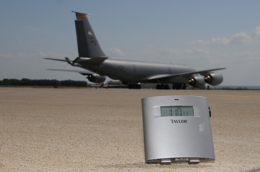 A KC-135 on the ramp in Sioux City, Iowa is the backdrop to a digital thermometer illustrating the temperature in Sioux City on July 25, 2012. Day time high temperatures have been in the high 90’s and consistently breaking 100 degree mark for most of June and July in Iowa. Showing a temperature of 110 degrees, the digital thermometer was placed on the concrete to illustrate how warm it is on the ramp. USAF Photo by: MSgt Vincent De Groot (released)