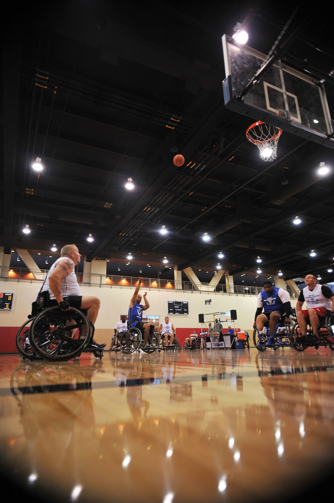 U.S. Air Force wounded warriors participate in the first all Air Force wounded warrior basketball camp on July 28, 2012 at the Warrior Fitness Center at Nellis Air Force base, Nev. The wounded warriors participated in a two day basketball camp that enabled them to play with new members of the wounded warrior program. (U.S. Air Force photo by Master Sgt. David Miller)