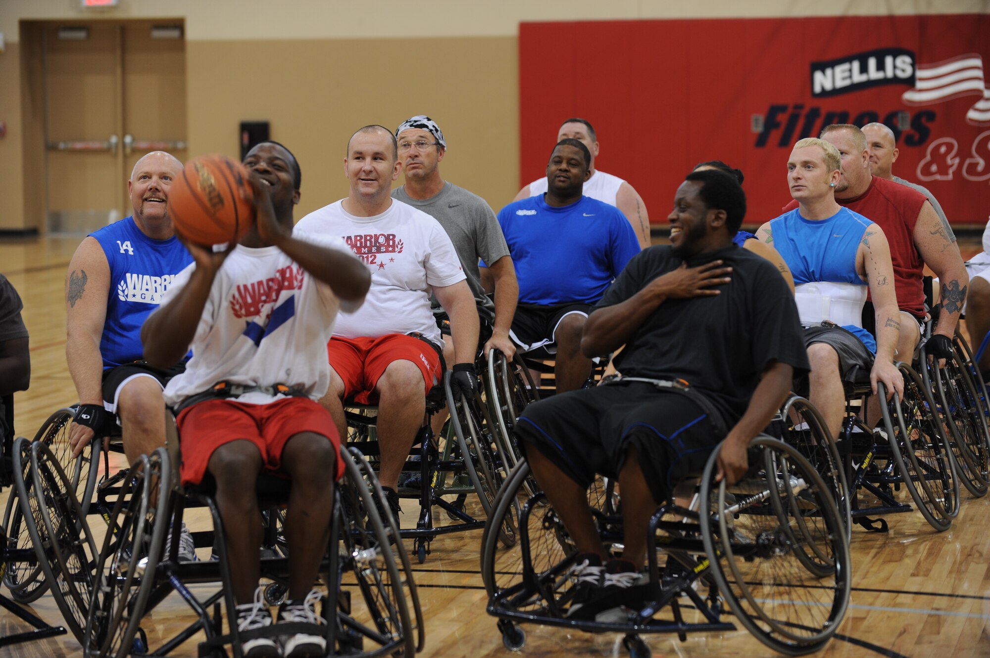 U.S. Air Force wounded warriors participate in the first all Air Force wounded warrior basketball camp on July 28, 2012 at the Warrior Fitness Center at Nellis Air Force base, Nev. The wounded warriors participated in a two day basketball camp that enabled new members and veteran members to play together for the first time.(U.S. Air Force photo by Staff Sgt. William Coleman)