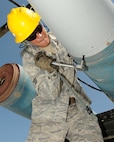 MINOT AIR FORCE BASE, N.D. – Senior Airman Ryan Heagy, 5th Munitions Squadron conventional maintenance crew member, a member of the 5th MUNS Global Strike Challenge team, Team Rockstar, assembles an inert joint direct attack munition here July 18. The team practices every day to prepare for the upcoming Global Strike Challenge at Barksdale AFB, La. (U.S. Air Force photo/Airman 1st Class Kristoffer Kaubisch)