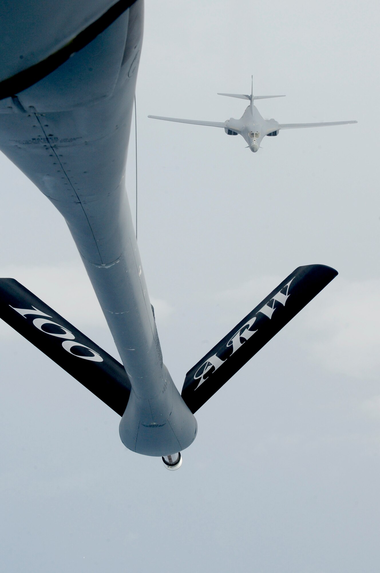 ENGLAND – A B-1B Lancer from Dyess Air Force Base, Texas, approaches a 100th Air Refueling Wing KC-135 Stratotanker July 31, 2012. Once close enough to the KC-135, the Lancer connects to the boom to receive fuel. (U.S. Air Force photo/Senior Airman Ethan Morgan)