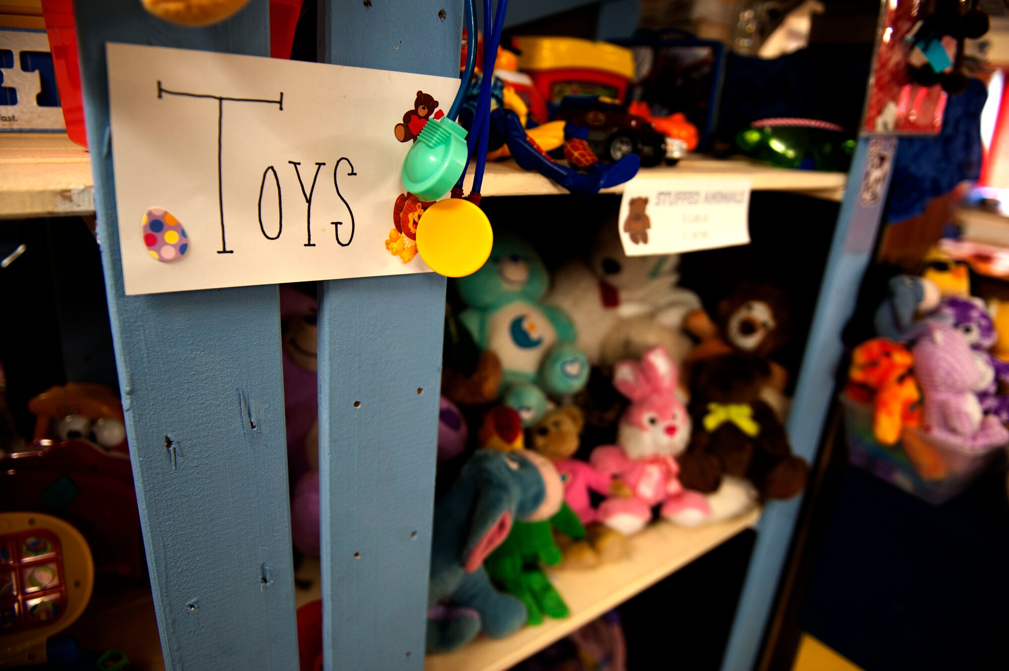 SPANGDAHLEM AIR BASE, Germany – A sign hangs on a shelf inside the Spangdahlem Spouses and Enlisted Member’s Club thrift shop here July 31.  All of the profits earned by the thrift shop are returned to the community through the spouse’s club. The shop is open 11 a.m. - 5 p.m. Tuesday through Thursday and the last Saturday of each month. For more information, call DSN 452-2243 or 06565-61-2243. (U.S. Air Force photo by Airman 1st Class Gustavo Castillo/Released)