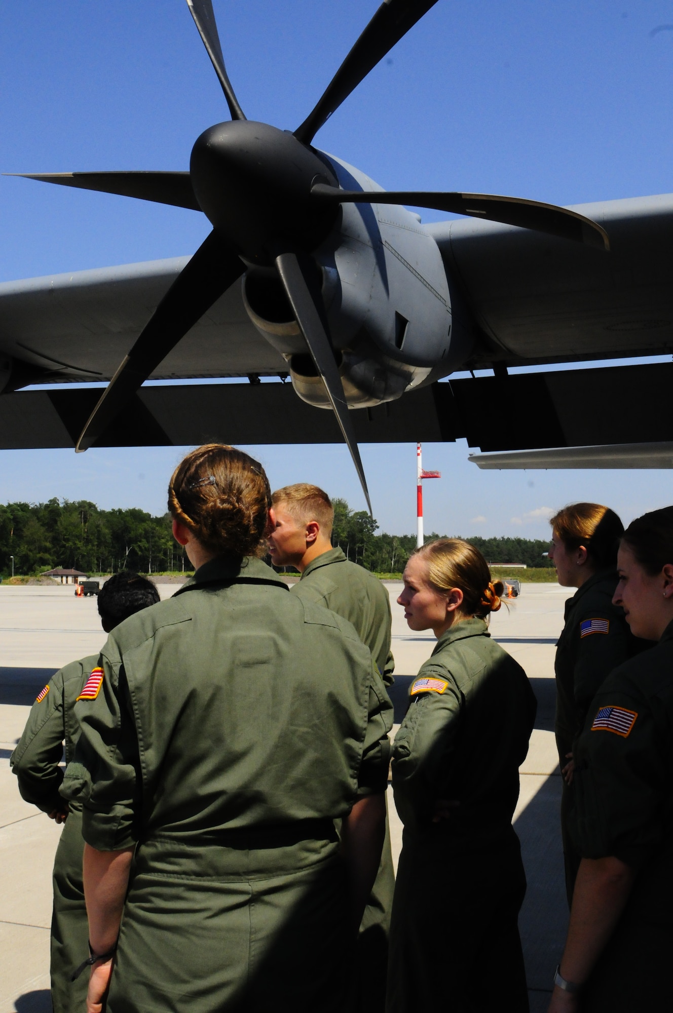 Air Force Academy cadets took a tour of a C-130J Super Hercules before an incentive flight as a part of the Operation Air Force at Ramstein Air Base, Germany, July 25, 2012. Ops AF provides both USAFA and AF Reserve Officers’ Training Corps cadets experience in the operational Air Force while focusing on different areas of cadet development. (U.S. Air Force photo/Airman 1st Class Hailey Haux)