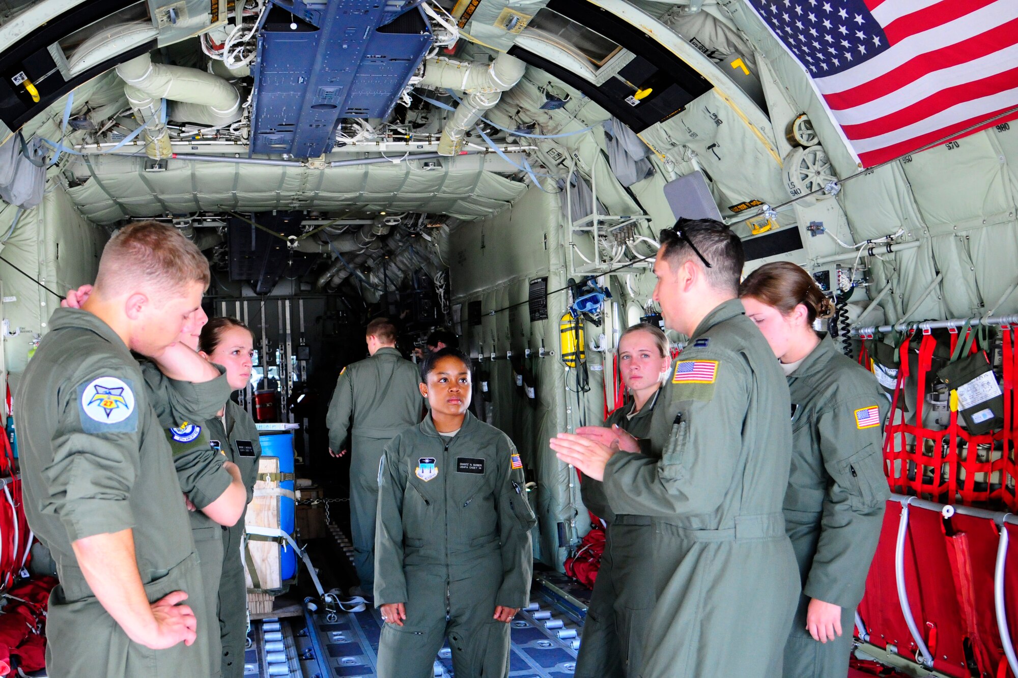 Air Force Academy cadets took a tour of a C-130J Super Hercules before an incentive flight as a part of the Operation Air Force at Ramstein Air Base, Germany, July 25, 2012. Ops AF provides both USAFA and AF Reserve Officers’ Training Corps cadets experience in the operational Air Force while focusing on different areas of cadet development. (U.S. Air Force photo/Airman 1st Class Hailey Haux)
