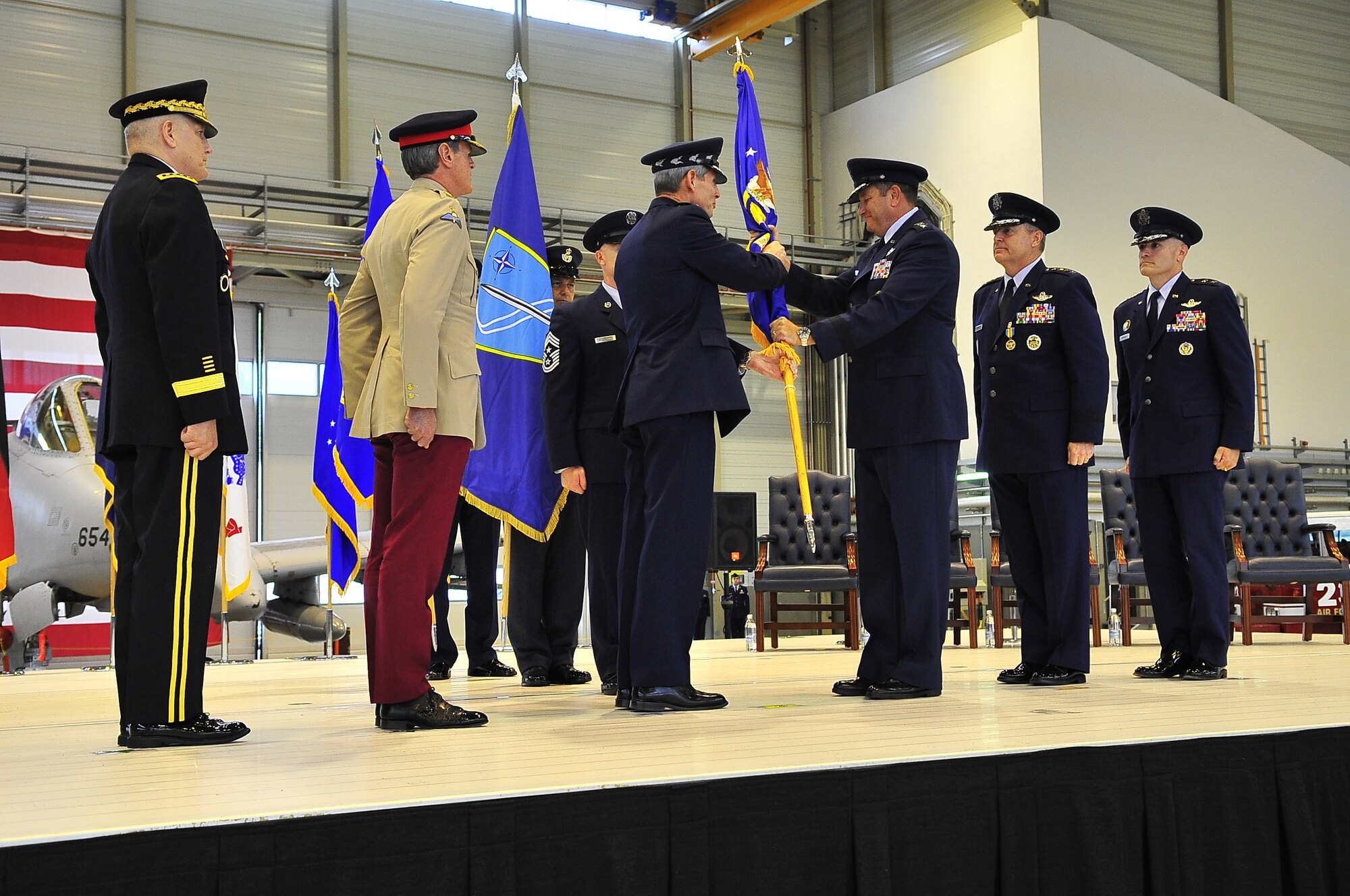 Air Force Chief of Staff Gen. Norton Schwartz gives Gen. Philip Breedlove the command of U.S. Air Forces in Europe during a change of command ceremony at Ramstein Air Base, Germany, July 31, 2012. During the ceremony, outgoing USAFE commander Gen. Mark A. Welsh III relinquished command after providing command and control for air, space and missile defense of activities in an area of operations covering almost one-fifth of the globe, which includes 51 countries in Europe, Asia, the Middle East, and the Arctic and Atlantic oceans.  (U.S. Air Force photo/Staff Sgt. Daylena Gonzalez)