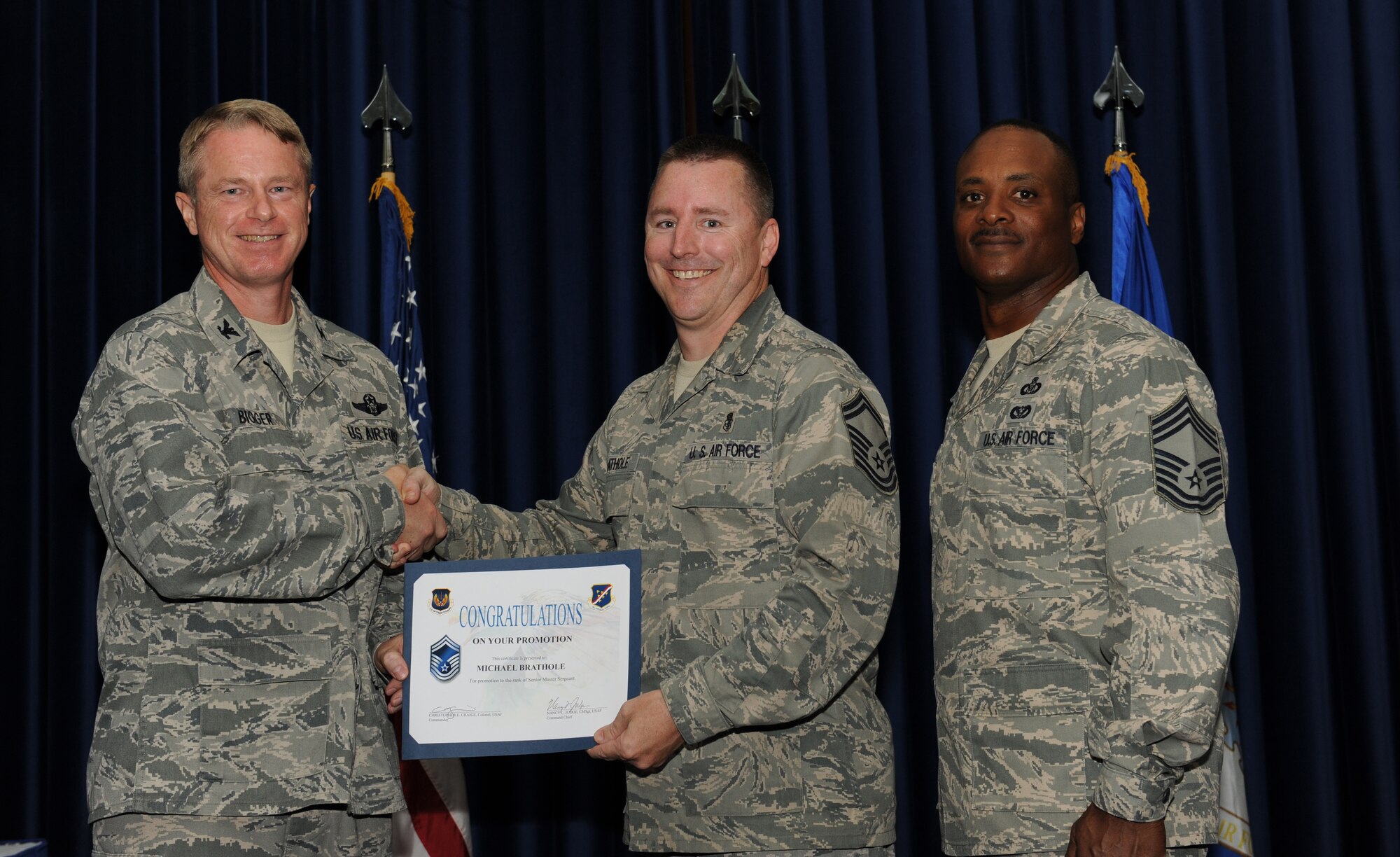 Michael Brathole, 39th Medical Support Squadron, is promoted to the rank of senior master sergeant July 31, 2012, at the Club Complex ballroom at Incirlik Air Base, Turkey. (U.S. Air Force photo by Senior Airman Jarvie Z. Wallace/Released)