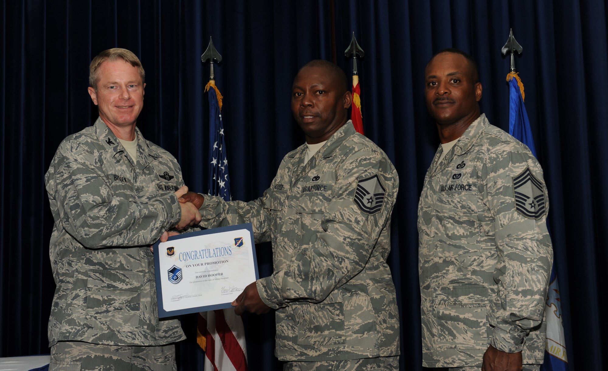 David Hooper, 728th Medical Air Mobility Squadron, is promoted to the rank of master sergeant July 31, 2012, at the Club Complex ballroom at Incirlik Air Base, Turkey. (U.S. Air Force photo by Senior Airman Jarvie Z. Wallace/Released)