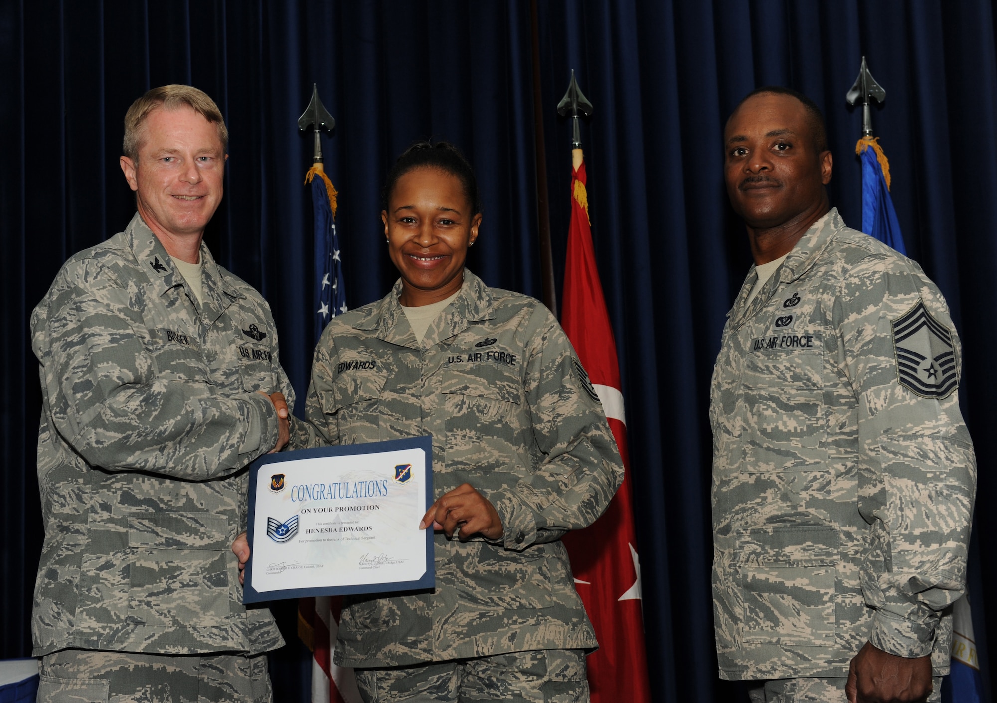 Henesha Edwards, 39th Force Support Squadron, is promoted to the rank of technical sergeant July 31, 2012, at the Club Complex ballroom at Incirlik Air Base, Turkey. (U.S. Air Force photo by Senior Airman Jarvie Z. Wallace/Released)