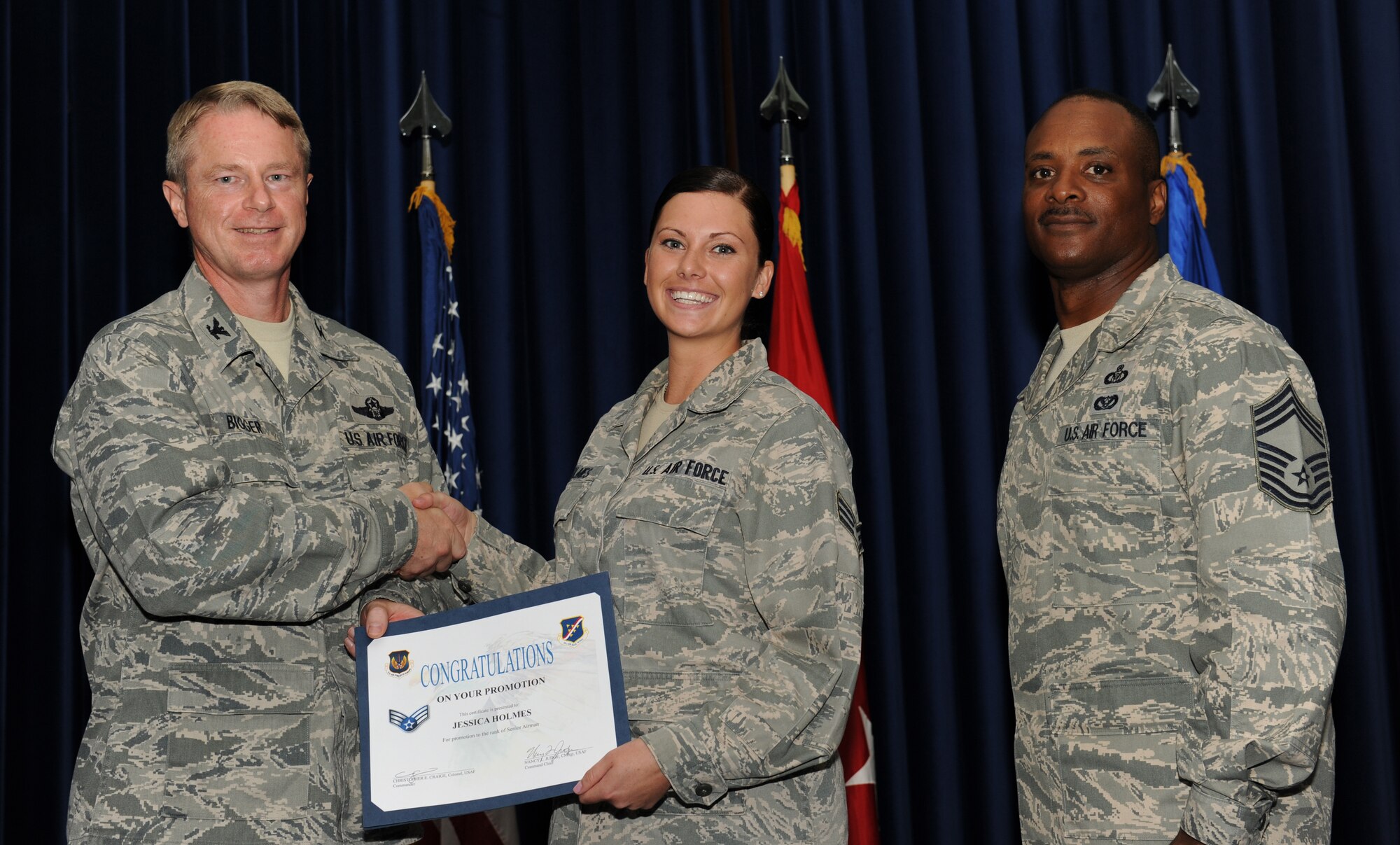 Jessica Holmes, 39th Logistics Readiness Squadron, is promoted to the rank of senior airman July 31, 2012, at the Club Complex ballroom at Incirlik Air Base, Turkey. (U.S. Air Force photo by Senior Airman Jarvie Z. Wallace/Released)