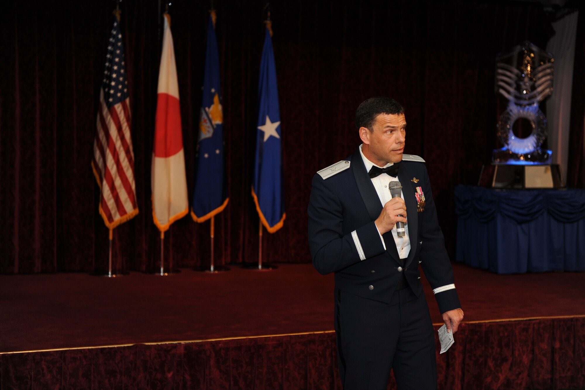 U.S. Brig. Gen. Matthew Molloy, 18th Wing commander, concludes the senior
NCO induction ceremony at Kadena Air Base, Japan, July 28, 2012. The
ceremony was dedicated to recognizing those that are putting on the rank of
master sergeant. (U.S. Air Force photo/Airman 1st Class Brooke P. Beers)
