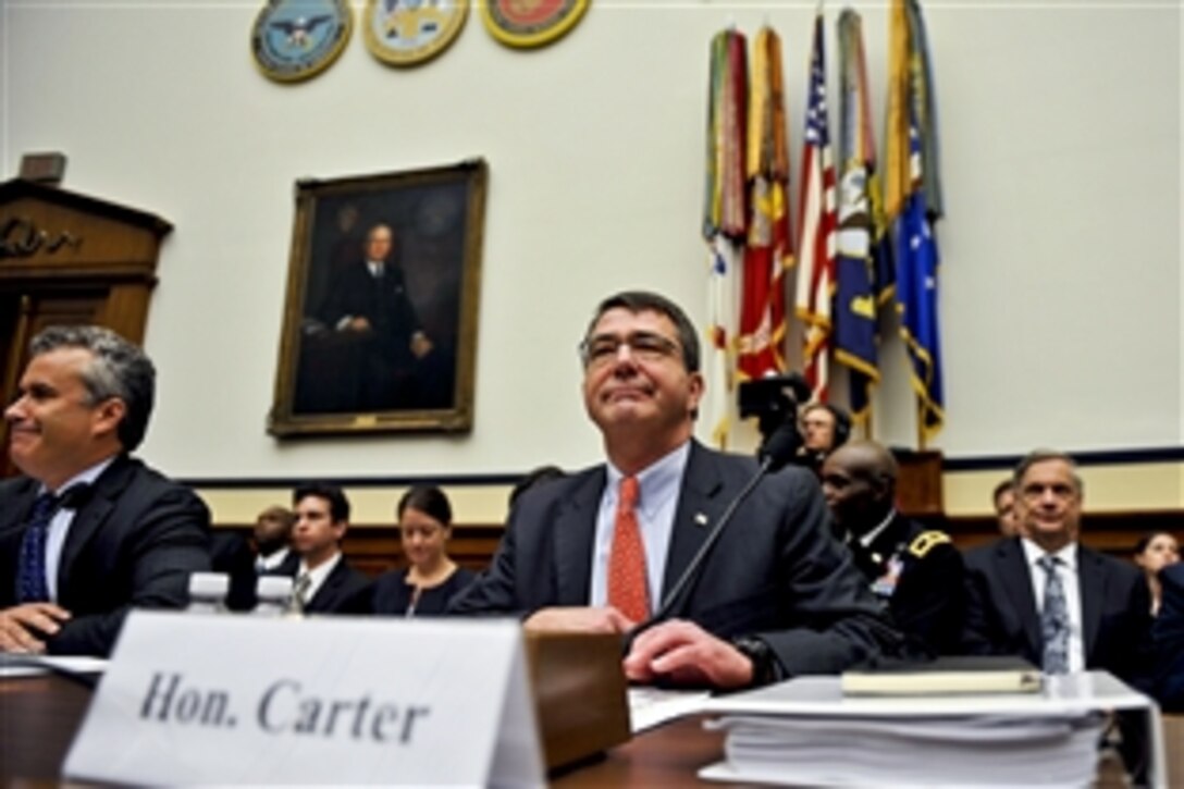Deputy Defense Secretary Ashton B. Carter listens to opening remarks during a hearing on options for implementing sequestration and its effects on the nation's defense before the House Armed Services Committee in Washington, D.C., Aug. 1, 2012. 