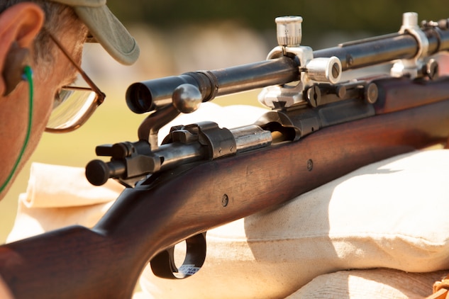 Fred Gowen, a veteran from the battle of Hue City, 1968, during the Vietnam War, waits with a round in the chamber for his target to reappear, during the Vintage Sniper Rifle Matches, Aug., 1, 2012 aboard Camp Perry, Ohio. When the targets appeared competitors had 20 seconds to adjust their sites and send a round down range before the targets would disappear into the pits and reappear in 20 seconds for another shot. Competitors shot 10 rounds at the 300 and 10 rounds at the 600 in this manner.
