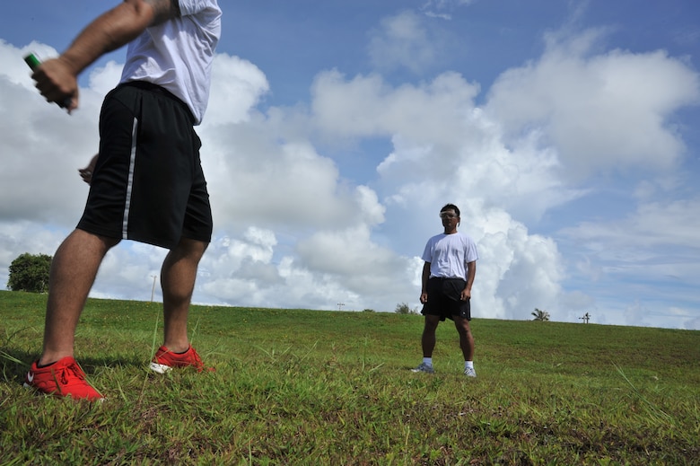 ANDERSEN AIR FORCE BASE, Guam-Department of Defense police officer cadets train with Oleoresin Capsicum Spray through a five-station obstacle course for qualification here July 27. After completing the course, the recruits will become DoD police officers for Andersen AFB and security guards for Naval Base Guam. This training is required so officers get first-hand experience using the weapon and can still perform their duties if they are sprayed during an incident. The academy is nine weeks for DoD police officer’s and five weeks for the security guards. The current class consists of 18 police officers and two security guards. Upon completion, 17 DoD police officers will be assigned to Andersen. This program was postured to enhance the security of the installation and ensure qualified personnel are manning the gates and patrols. (U.S. Air Force Photo by Staff Sgt. Alexandre Montes/RELEASED) 